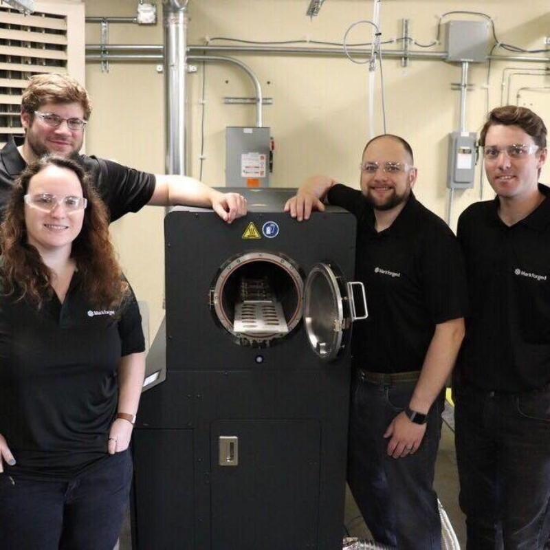 Team photo of Markforged engineers in front of the Sinter-2